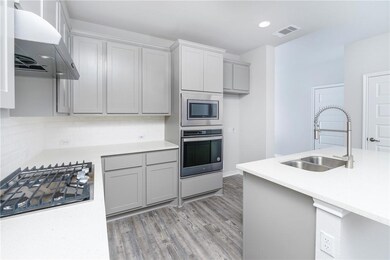 1613 Winding Stream Trail unit 75, Leander, TX 78641 - photo 3