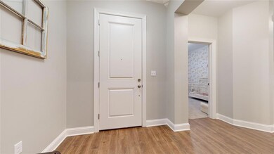 Entry way and hall to 3 bedrooms