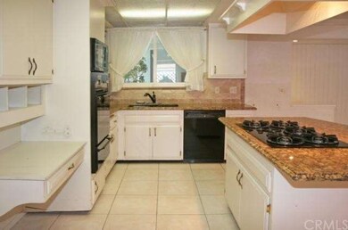 Another view of kitchen showing the newer applianc