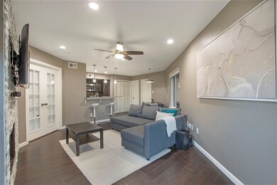 Living room with recessed lighting, dark wood-styl