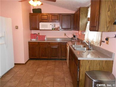 Kitchen. Vaulted ceiling and new ceiling fan