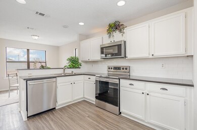 Kitchen featuring appliances with stainless steel 