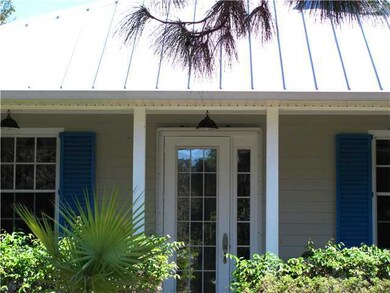 Exterior Front. Concrete block construction with H