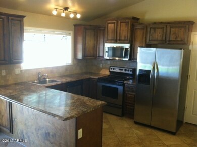 kitchen w/ custom lighting