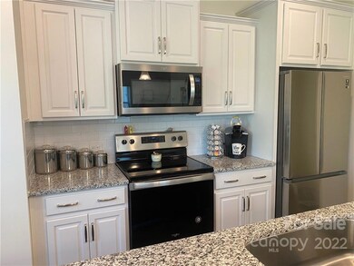 Granite countertops and stainless steel appliances