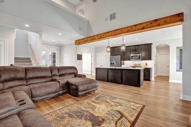 Living room featuring light hardwood / wood-style 