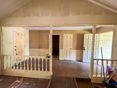 Formal entryway with access to back patio