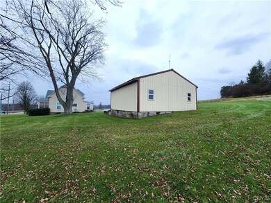 The cornfield spans Franklin and Clapp Road behind