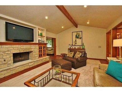 Living Room. BEAUTIFUL LIVING W/ STONE FIREPLACE &