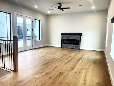 BLACK accent electrical fireplace. The light color