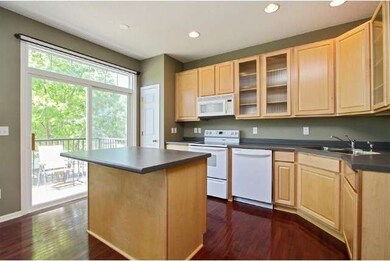 Bright Kitchen, center island, maple cabinets, woo