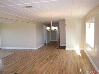 Dining area facing hallway toward bedrooms