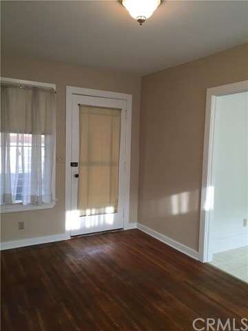 Living room of back unit which is a one bedroom, o