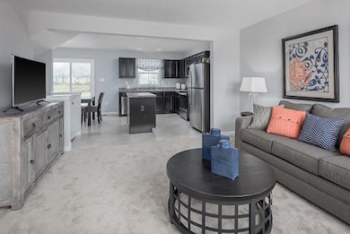 Enjoy a spacious main level, with space to enjoy with family and friends!  *Photo is from a 1220 Model.