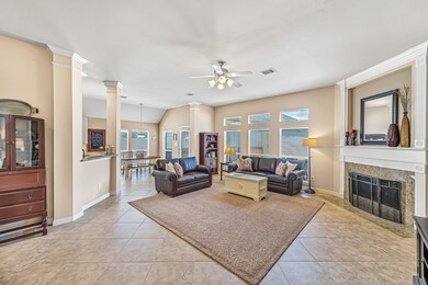 The family room is large and inviting. Just imagine the amazing times you'll have with family and friends gathering around the fireplace during the holidays!