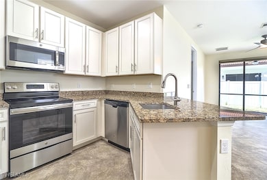Kitchen featuring granite counters & 42in upgraded