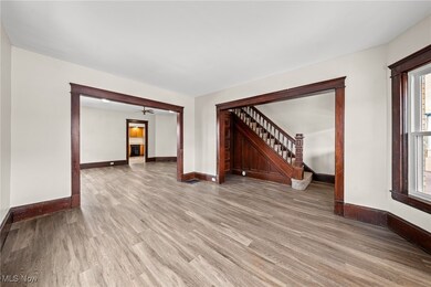 Spare room featuring hardwood / wood-style flooring