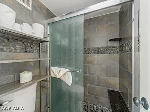 Bathroom featuring a stall shower