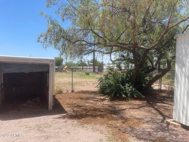 Yard-back left-628 S Desert View
