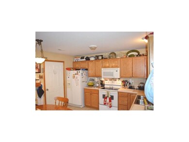 Clean, white kitchen.  Appliances stay!