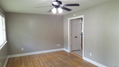 Family room with Hardwood floors and newly painted