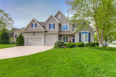 View from corner. Nice lush front yard. Covered fr
