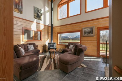 Living Room W/Wall of Windows