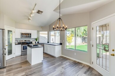 Beauitful kitchen overlooking backyard