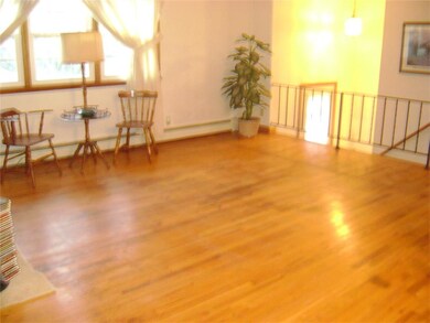 GREAT ROOM with carpet removed and NEW LOOKING HAR