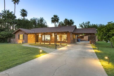 ~130' driveway to porte cochere & garage