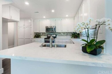 Soft white and grey quartz countertops are perfect