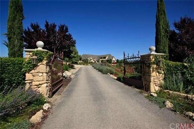 As the gate slowly swings open, you enter the Prov