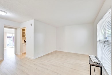 Unfurnished room featuring light wood-style floor