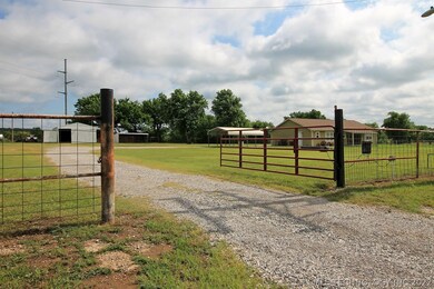 The property has an electric gate entry leading to