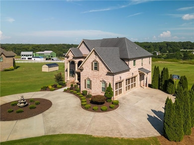 View of front of house featuring roof with shingle