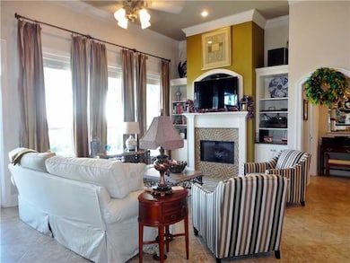 Den/Family/Great Room. LOTS OF CROWN MOULDING AND