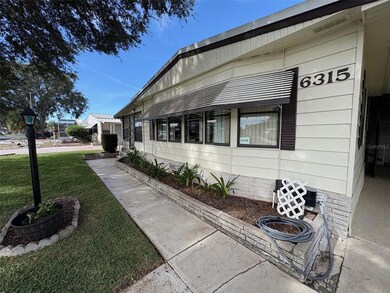 6315 Grove Pointe Drive South E, Winter Haven, FL 33884 - photo 5