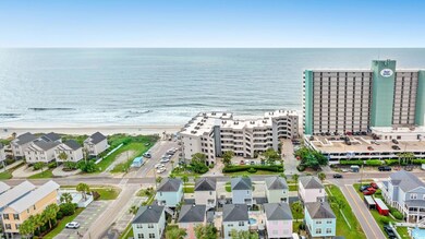 Aerial view of waterfront with a beach