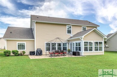 Rear of home with extended patio perfect for outdo