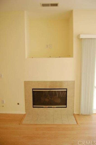 Great Room Gas Fireplace.  Entertainment Alcove Above For Stereo & TV.