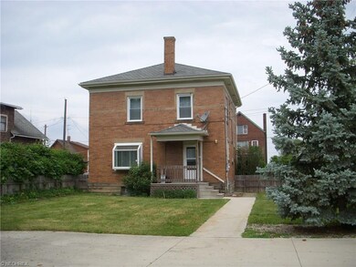 The rear view of your new colonial with the back y