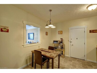 Updated, eat-in kitchen has room for a spacious ta