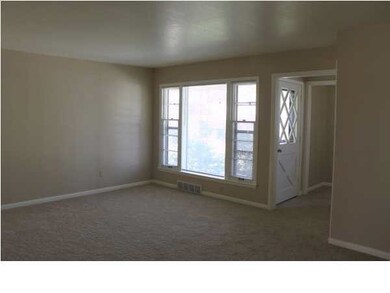LIVING ROOM WINDOW ALLOWS PLENTY OF NATURAL LIGHTI