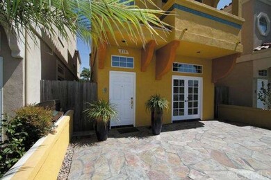 French doors lead to the front patio bringing the 