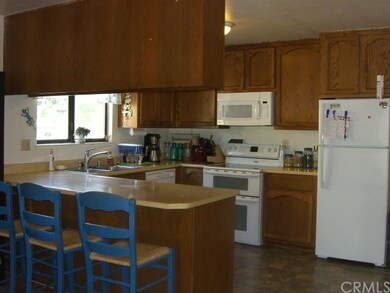 Kitchen with eat-in bar and includes dishwasher, s