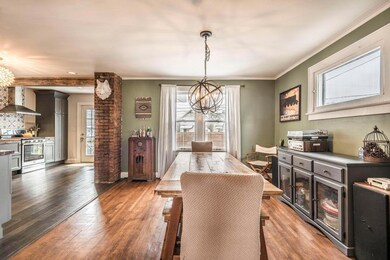 Open Concept Dining Room Into Kitchen