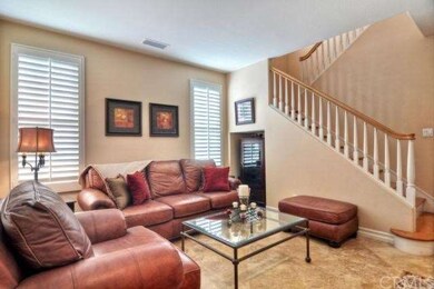 Formal Living Room With Custom Travertine Floors