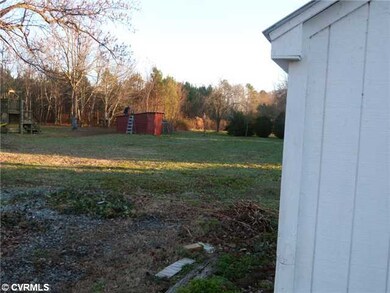 Exterior Back - Another storage building on back of lot