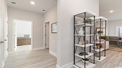 Hallway featuring light wood-type flooring