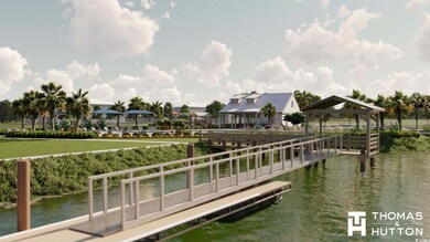View of dock featuring a water view and a gazebo